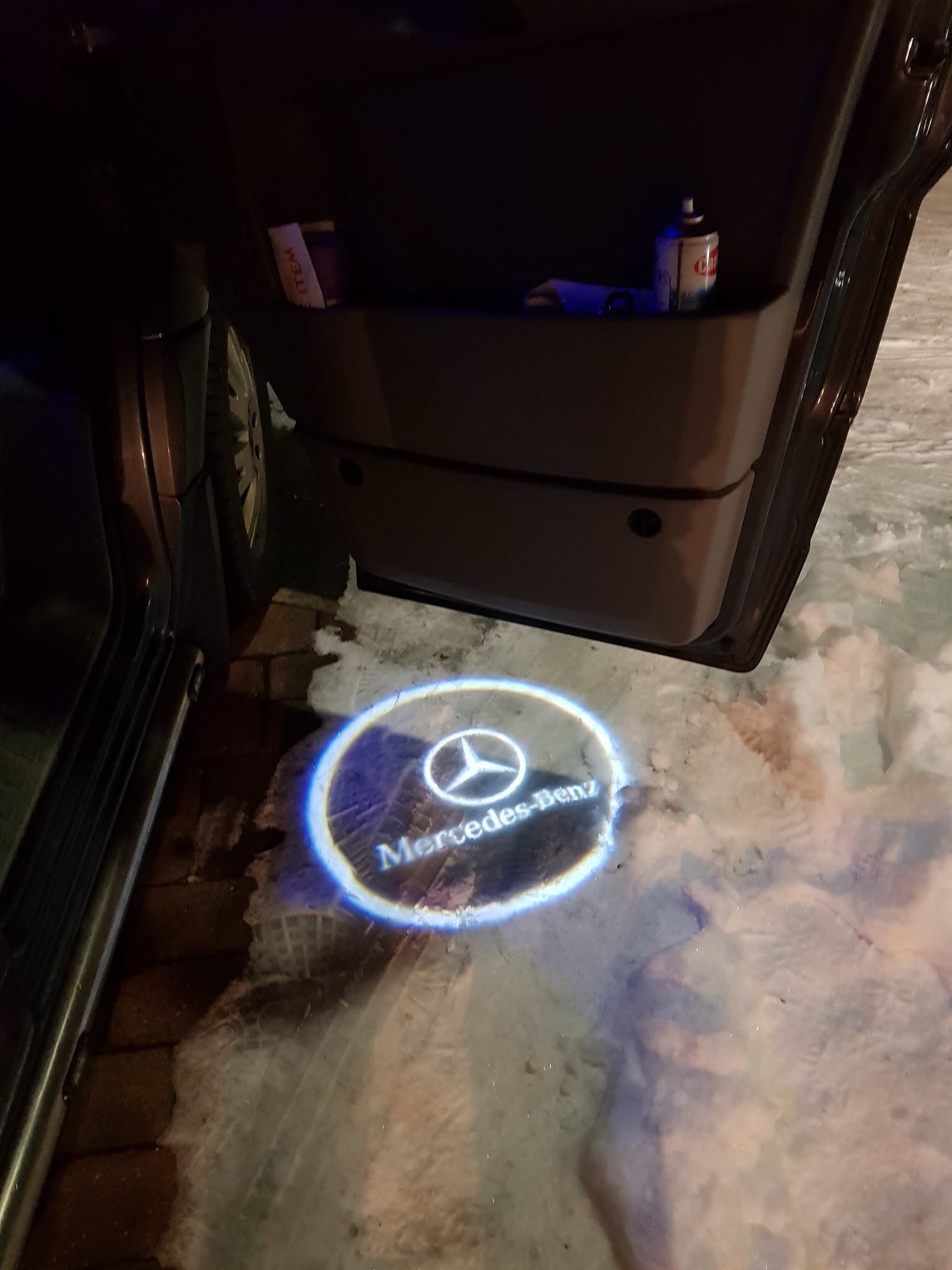 Custom Mercedes puddle light installation